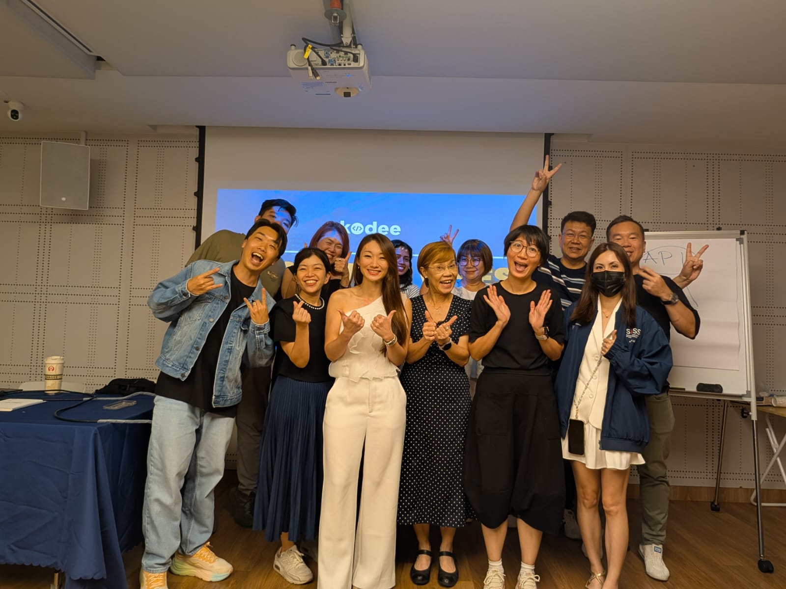 Group photo from a Kodee workshop with smiling participants gathered together.